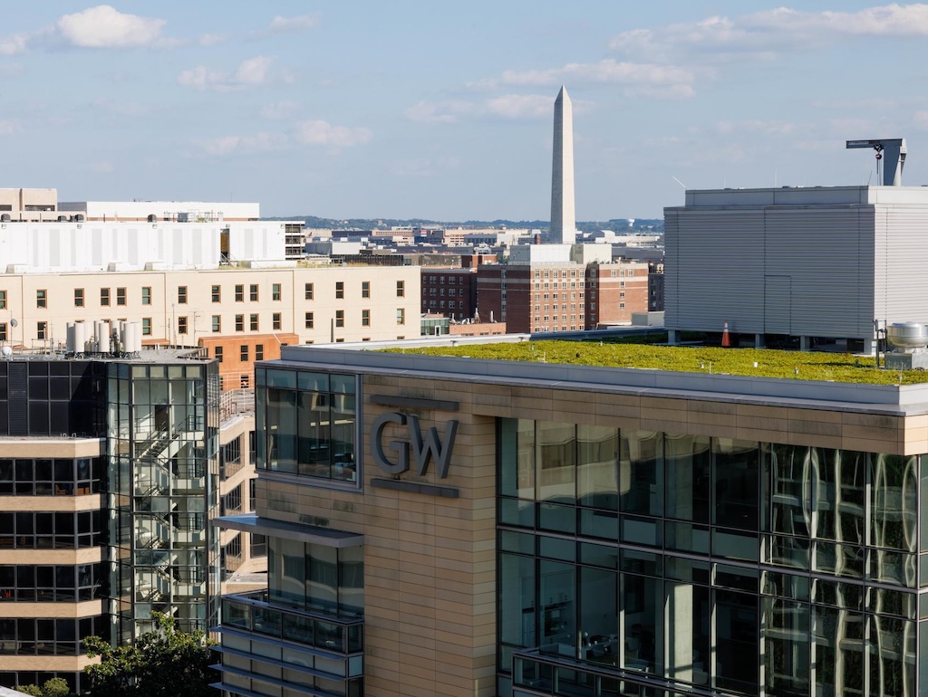 A view of the Washington D.C. skyline with a GW building and the Washington Monument in view