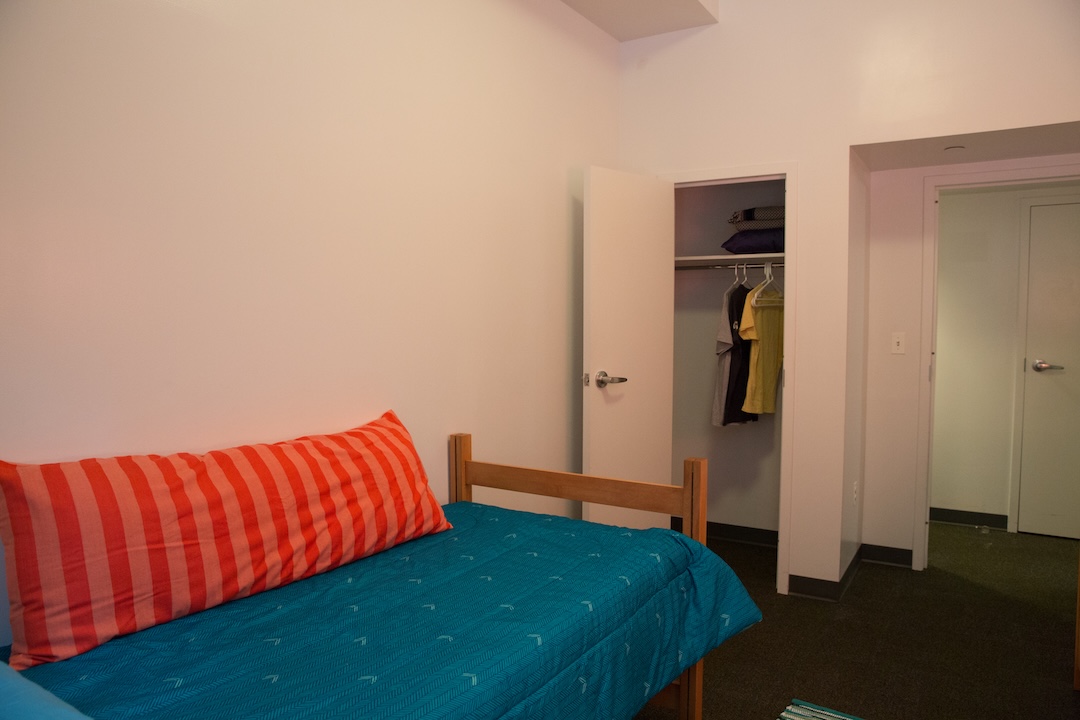 South Hall Bedroom with open closet and doorway.